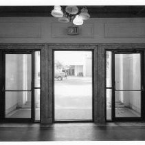 Interior view of the lobby and the light fixtures at the entrance in the Merrium Apartments before demolition