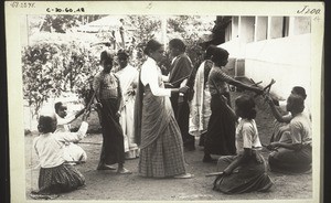 Girls of the boarding school in Tschombala (India) playing the game with the staves
