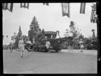 Washington State's colonial coach float in the Tournament of Roses Parade, Pasadena, 1931