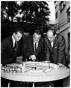 Signing of contract and model of Chavez Ravine, 1960