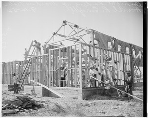 Church members erect framework of Seventh Day Adventist Church (Baldwin Park), 1952