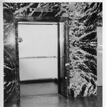 Interior view of the fully automatic elevator in the new California State Department of Education building on Capitol Mall and 7th Street