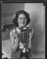 Teenager Barbara Watson with her beauty contest trophy, San Diego, 1935