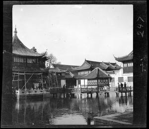 View of water front houses in Hong Kong (Tea Houses in Shanghai?), China, ca.1900
