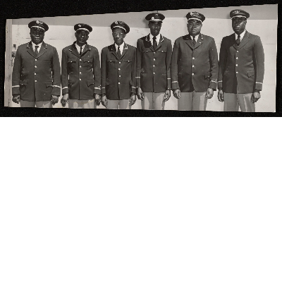 Group photograph of six sleeping car porters in uniform