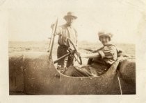 Nicholas and Adeline Robles with automobile