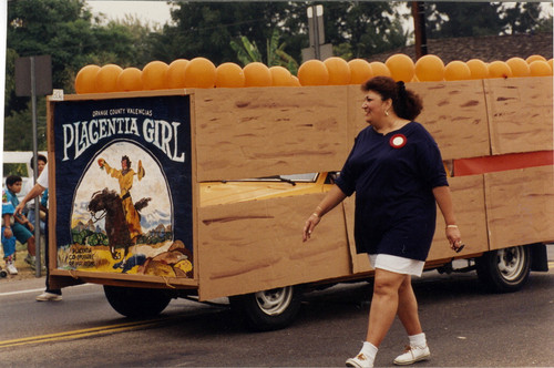 Photograph of float showing Placentia Girl orange crate label