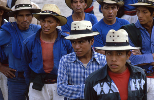 Mayan men standing in line to vote, Chajul, 1982