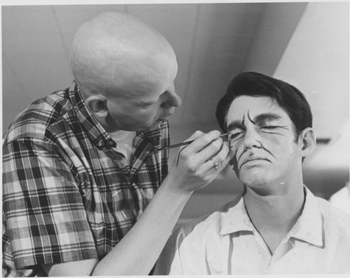 Make-up application for the Teenage Drama Workshop production of Rumpelstiltskin (2 of 4), 1966