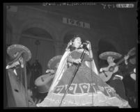 Rosa Michoacana sings in front of City Hall during Mexican Independence Day celebration in Los Angeles, Calif., 1961