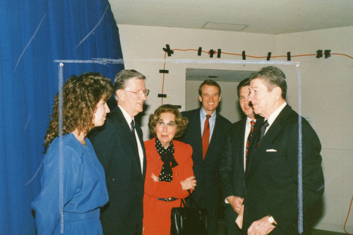 An unknown woman, Chancellor Runnels, Mrs. Brock, Regent Chair Tom Bost, and President Davenport greeting President Reagan