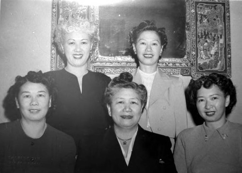 The Chung sisters: Florence Chung Lon, Mildred C. Handel, Anna Chung Yip, Margaret J. Chung, and Dorothy Chung Siu. (Dorothy is seated at right and Mildred Chung has a paratrooper's or submariner's badge on her left pocket)