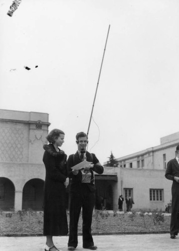 Young man with scientific apparatus