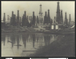 Oil wells, showing derricks in an oil field, ca.1930