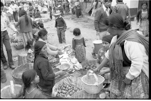 Civilian merchants and customers at the market, Chajul, 1982