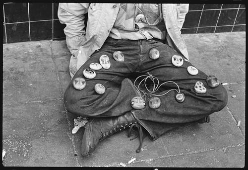 Boy selling painted stones on his legs, Haight-Ashbury 1967