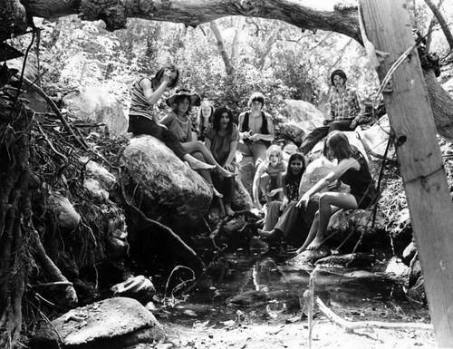 Manson family by a creek on Spahn Ranch