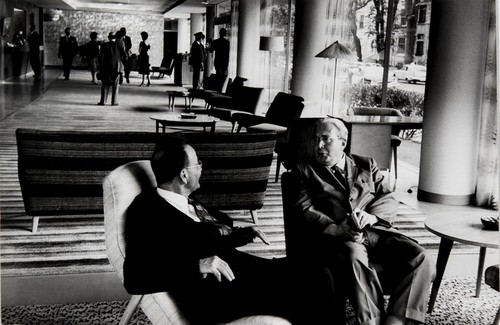 Leo Szilard with visitor in the Dupont Plaza Hotel lobby; Washington, DC - 2