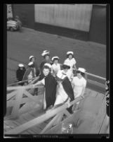 Ten student nurses boarding the U.S.S. Repose, San Pedro, 1949