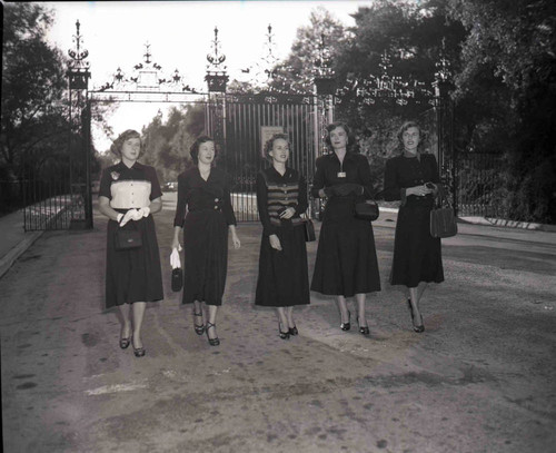 Junior Rose Bowl court in front of the Huntington Library Gates