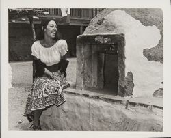 Linda Margarain performs many chores at the Petaluma Adobe, including spinning, grinding corn, candlemaking, baking, etc, Petaluma, California, 1977