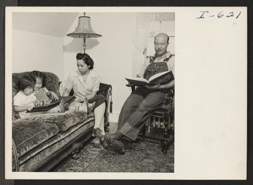 The Okubo family is shown in the living room of their home on a farm near Palatine, Illinois. Joan, age