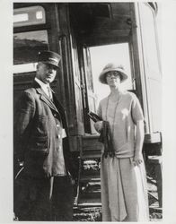 Jay F. Meacham and Clara Meacham stand by a Petaluma and Santa Rosa Railroad car, Sonoma County, California, 1924