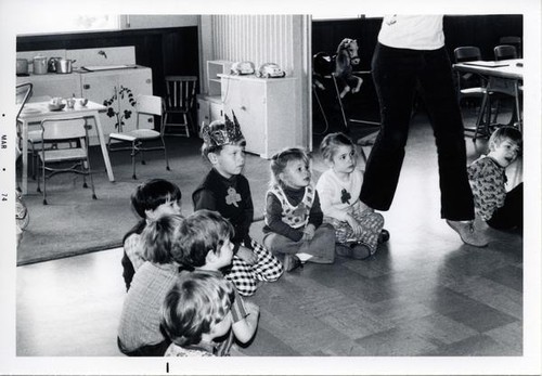 Group of children sitting on the floor