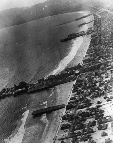Aerial view of piers along the ocean