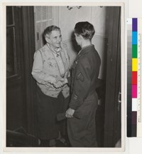 "Gertrude Stein bids goodbye to Sgt. Robert Ashley, right, of Portland Oregon, at her home in Paris."