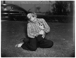 Ex-trapped kitten adopted (Long Beach), 1951