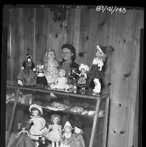 A woman with dolls