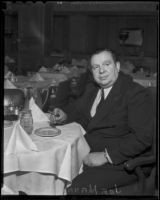 Joe Mann, Hollywood maître d’hôtel smokes a cigar, Los Angeles, 1936