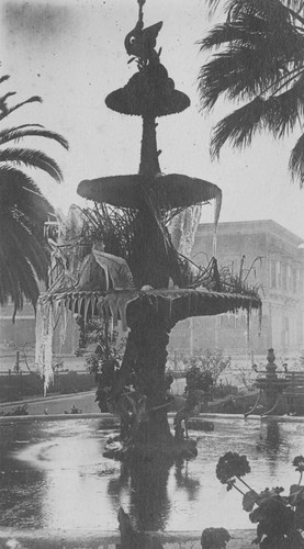 Plaza Park fountain frozen in January, Orange, California, 1913