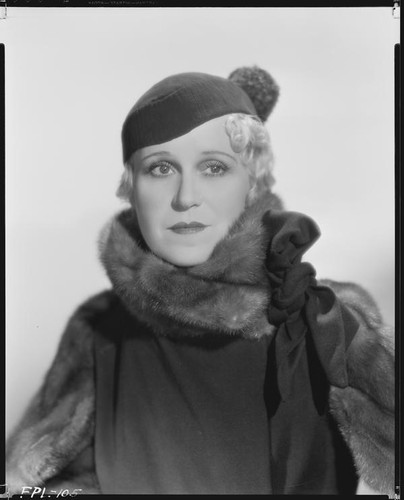 Peggy Hamilton modeling a coat and hat, 1933