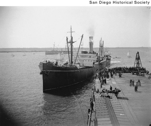 The ship Lord Lonsdale preparing to dock at a pier