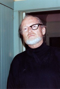 John Quitman Lynch wearing half of a pair of glasses
