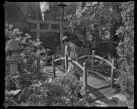 Kimiko Tamura in Toyo Y. Maeda's Japanese garden on North San Pedro Street, Los Angeles, 1935