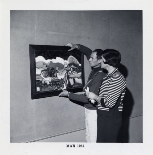 Professor and student observe painting, Scripps College