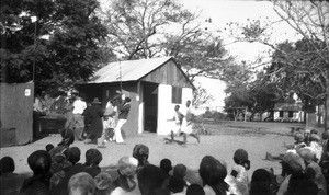 African people in a play during Blue Cross celebrations, Antioka, Mozambique, 1933
