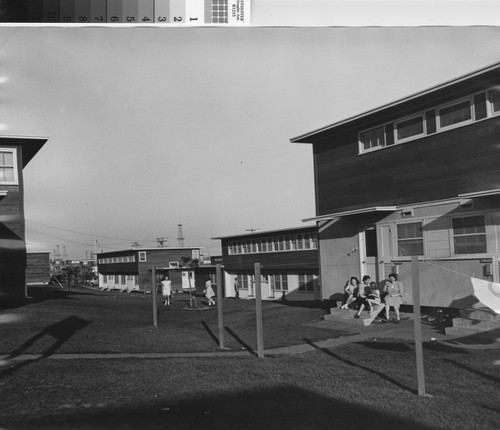 Photograph of residents in courtyard of Normont Terrace
