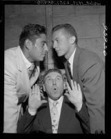Tennis players Tony Trabert and Pancho Gonzales with Beans Reardon at Bond Club luncheon in Los Angeles, Calif., 1955