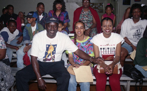 Lou Dantzler posing with others at a Challengers Boys and Girls Club event, Los Angeles, 1996