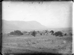 Mountain range in the savannah, Tanzania, ca.1893-1920
