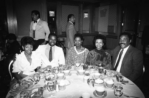 Guests posing together at during the NAACP Diamond Jubilee luncheon, Los Angeles, 1984