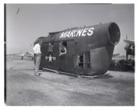Marine helicopter fuselage salvaged from mountaintop, 1953