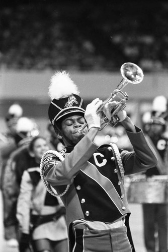 Carson High School student performing a solo at a LAUSD Band and Drill Team Championship, Los Angeles, 1983