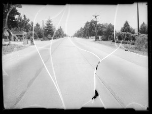 Street shots on Ventura Boulevard in front of 15501, Hamilton vs. Hammond Lumber Company, Los Angeles, CA, 1935