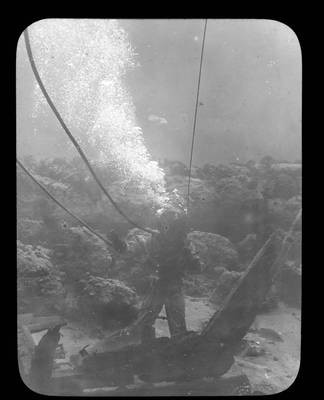 Diver working at a wreck site, 1914