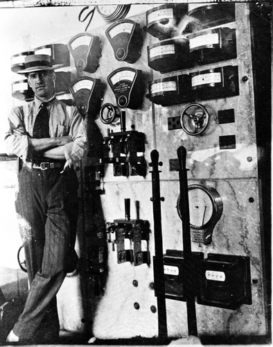 Man next to switchboard